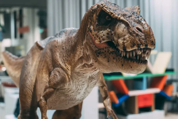 Illustration of dinosaur, animals, and reptiles in a natural setting.