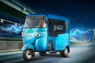 Electric Bajaj GOGO three-wheeler showcasing modern design and eco-friendly features.