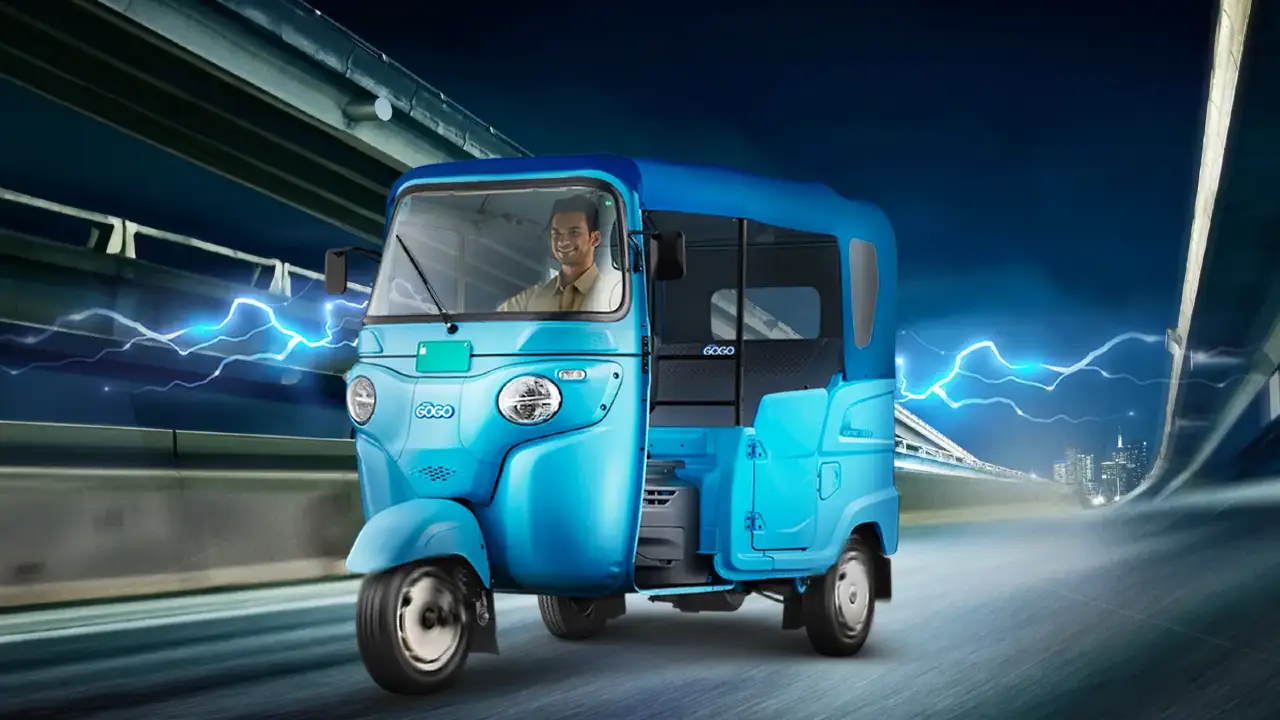 Electric Bajaj GOGO three-wheeler showcasing modern design and eco-friendly features.