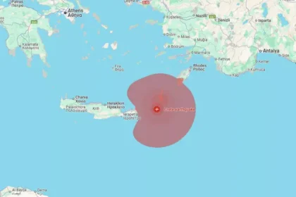 Couple in bed during earthquake with safety warning alerts in Greece.