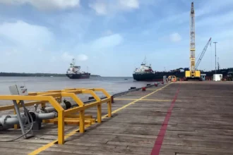 Guyana's government enforcing oil spill safety rules for oil companies.