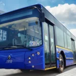 Electric bus labeled JBM ECO-LIFE promoting zero emissions in India.