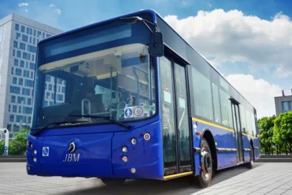 Electric bus labeled JBM ECO-LIFE promoting zero emissions in India.