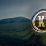 Kia logo on a modern car emphasizing brand identity.