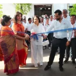 Kinetic Group's electric vehicle factory with robots and computer systems in Maharashtra.