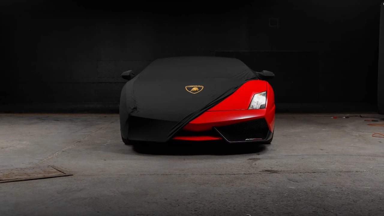 Red Lamborghini Gallardo luxury supercar with sleek design.