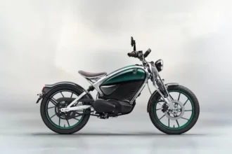 Royal Enfield Flying Flea and electric motorcycle displayed together.