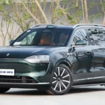 Chinese luxury electric car Seres Aito M9 with smart screens and tech features.