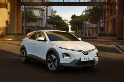 Vietnamese VinFast VF6 white compact SUV showcasing modern design and tech features.