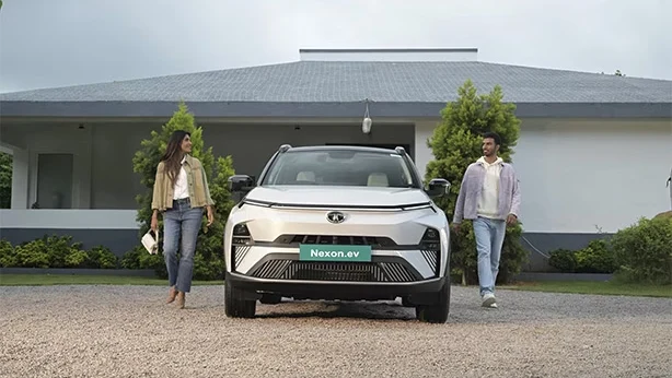 White Tata Nexon SUV parked outdoors.